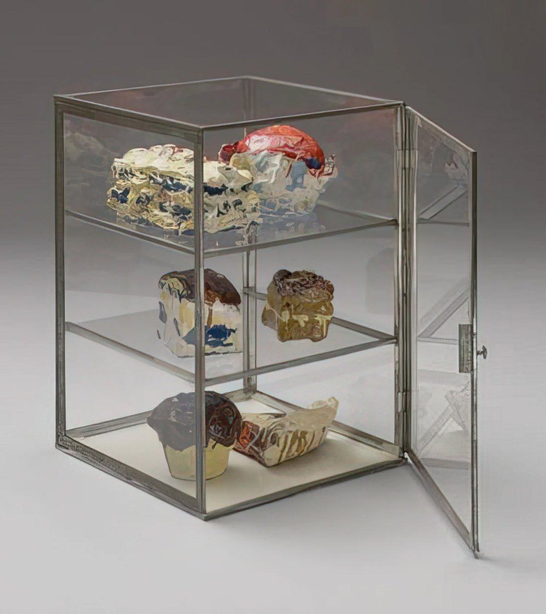Oldenburg van Bruggen Sculptures: Monumental Whimsy and the Poetics of the Everyday - PASTRY CASE 1961 by Claes Oldenburg
